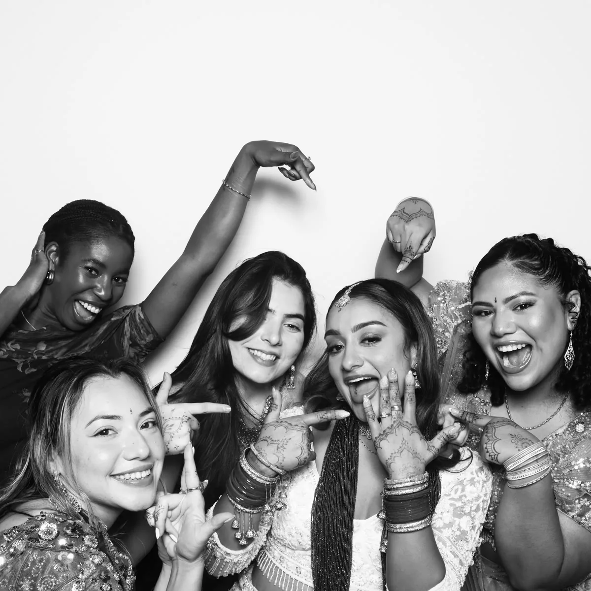 Guests posing at Clutch City glam photo booth Houston TX